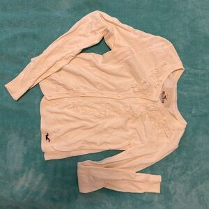 Hollister Off-White Sweater with Floral Accents